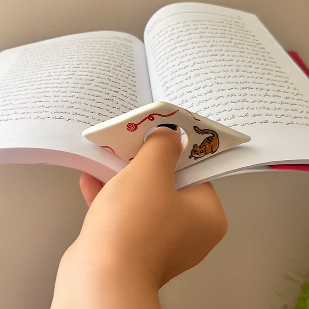 handmade ceramic book holder with cat design handmade ceramic book holder with cat design