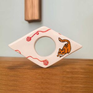 Home handmade ceramic book holder with cat design