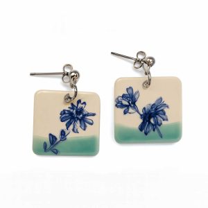 Home handmade ceramic earrings with floral design