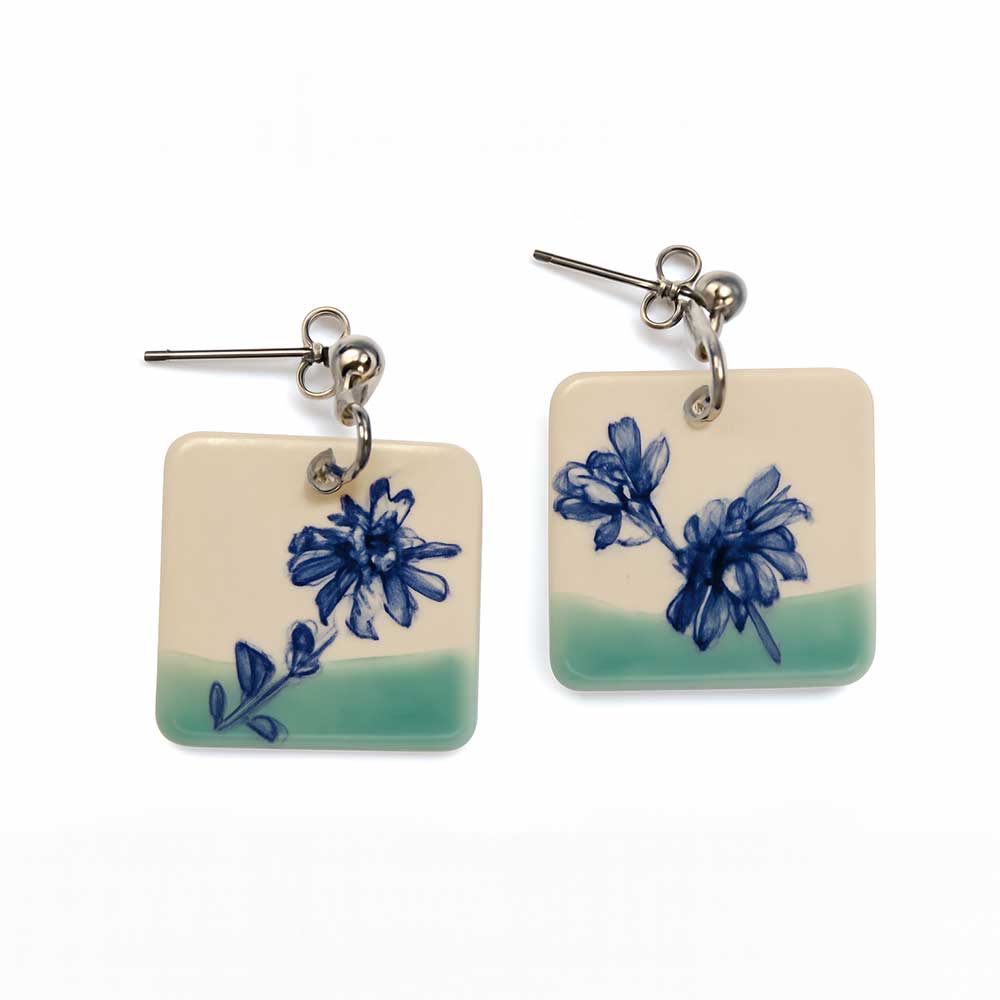 handmade ceramic earrings with floral design handmade ceramic earrings with floral design